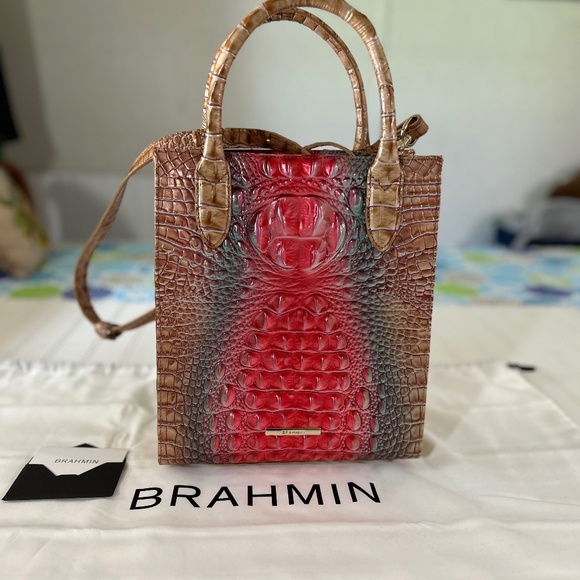 Brabhim Tote. H11” x W3” x L9”. Rolled handle 4.5 drop. 23” Crossbody strap. - Picture 1 of 4